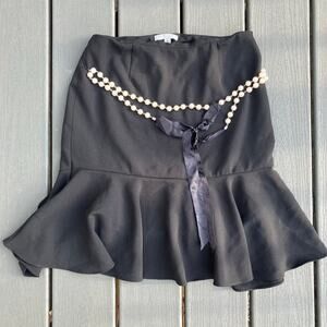 Vintage black trumpet skirt with pearl belt and ribbon bow tie, Alberto Makali